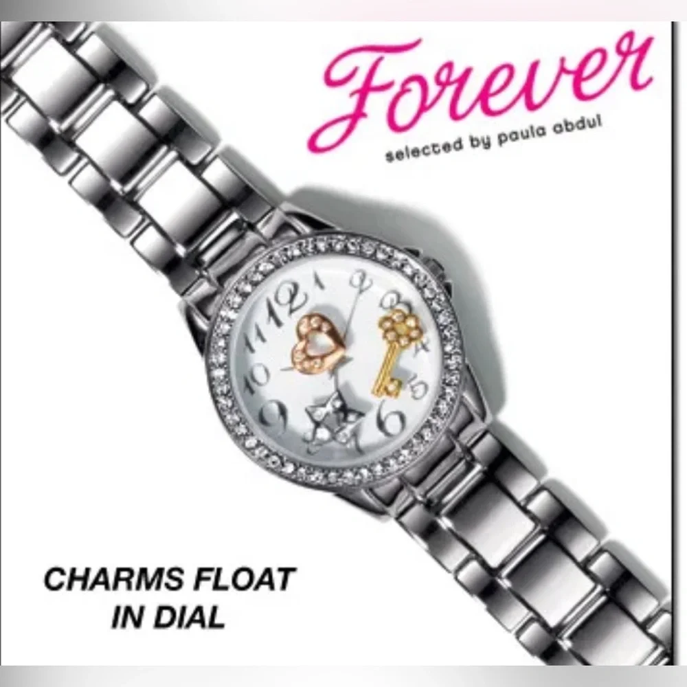 VGC Vintage AVON Floating Charms Silver tone Wristwatch. - Picture 3 of 16